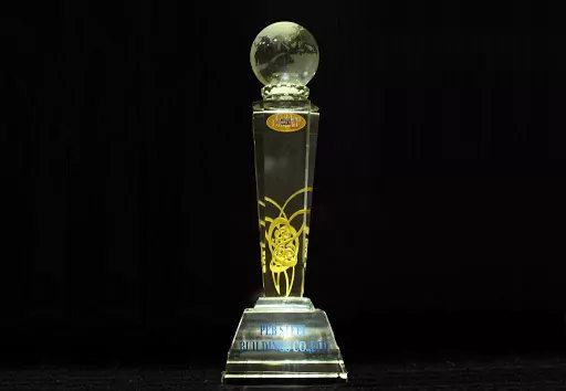 Golden Dragon Award crystal trophy for PEB Steel 