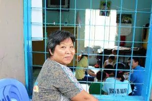 Happy smile of a woman in Home Of Blind