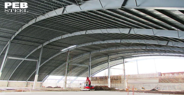 Even for industrial and distribution buildings, curved roofs