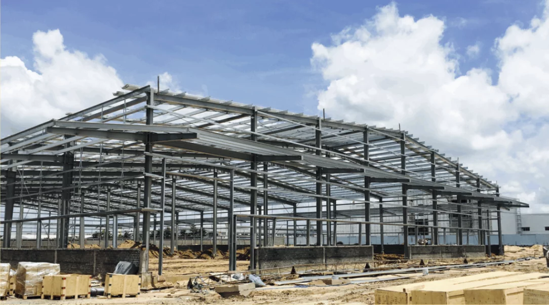 Pre-engineered steel factory during a construction process