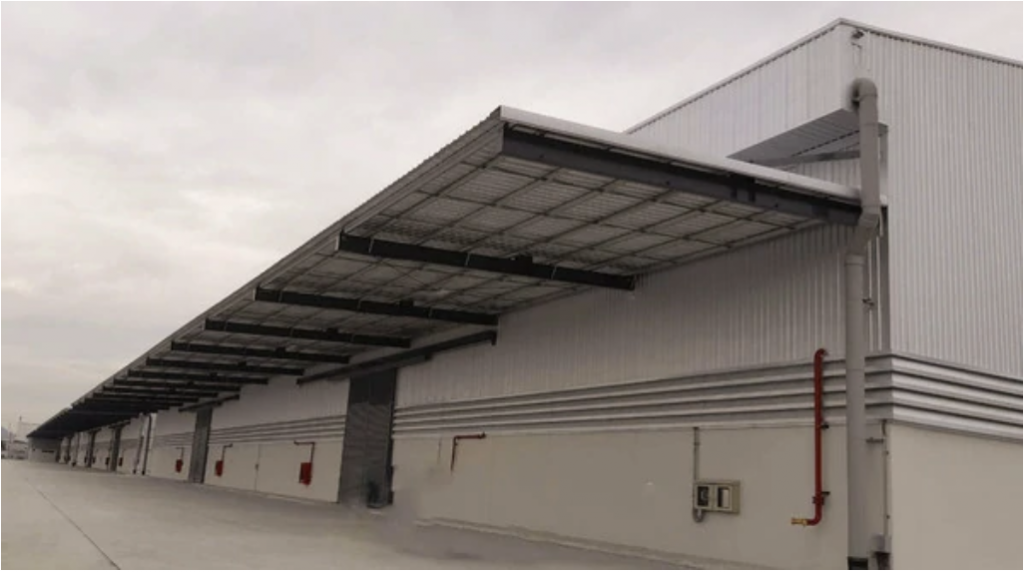 Pre-engineered steel warehouse design with large canopy