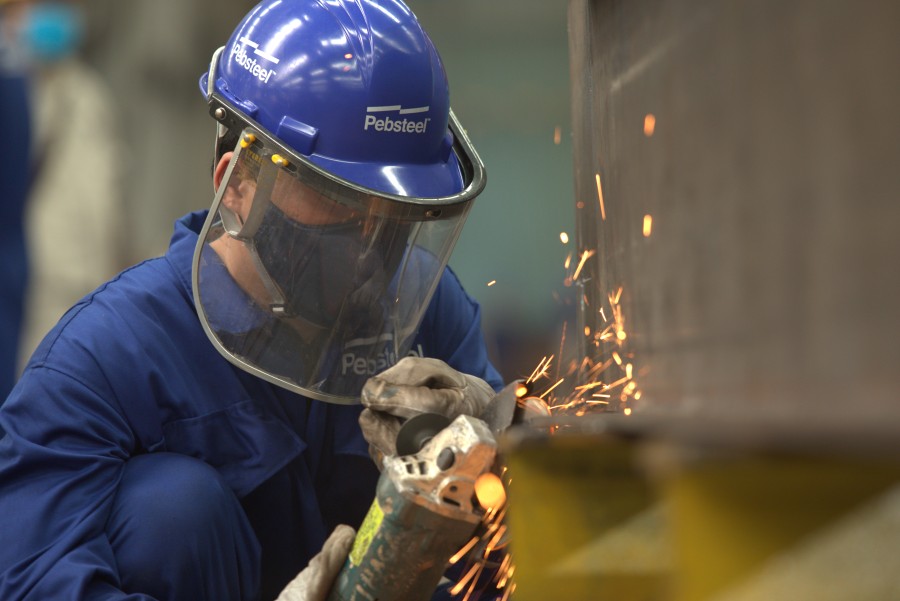 Top steel fabricators ensure precision through expert design, material selection, cutting, and welding techniques