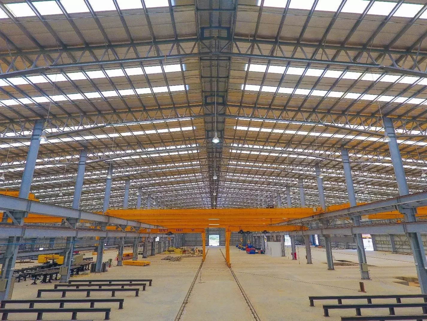 PEB Steel constructs prefabricated factory buildings.