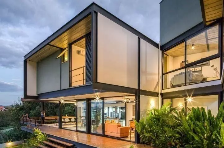 A two-story prefabricated steel house model with a youthful and stylish design