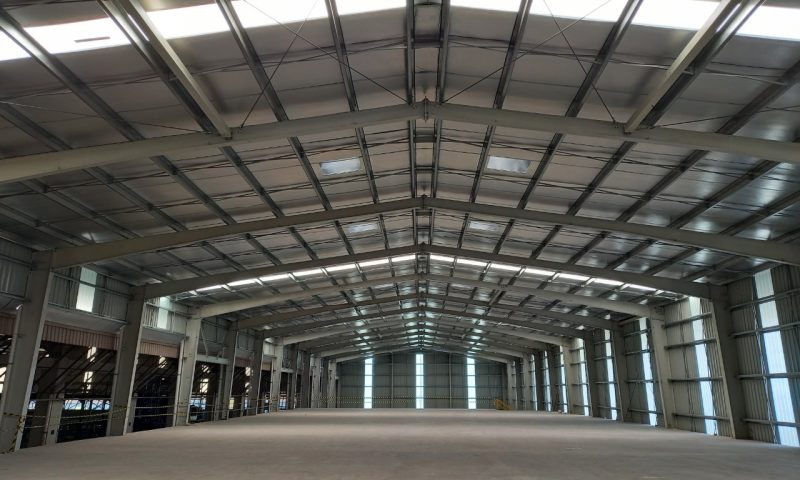 A steel shed uses a steel frame as its primary structural support.