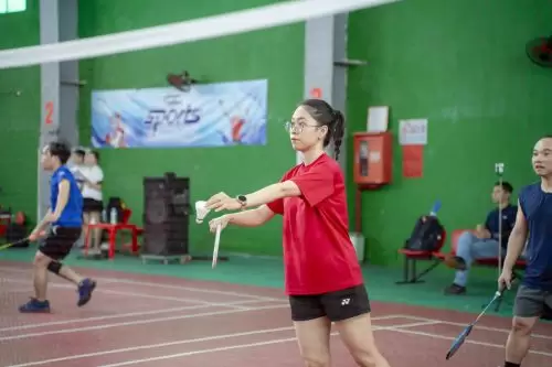 Pebsteel badminton players competing with high-speed rallies and impressive techniques