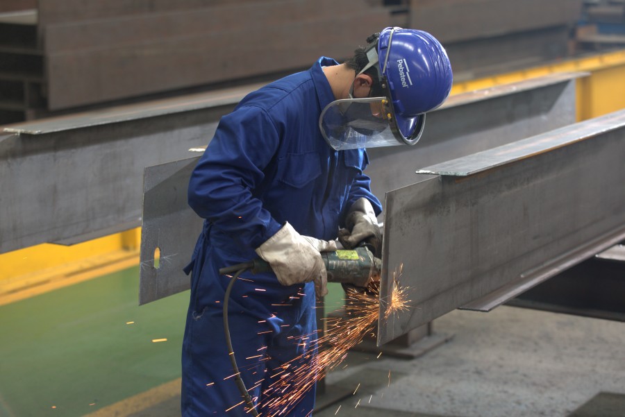 Steel fabrication work in progress — an essential step in building industrial warehouses, workshops, and logistics hubs