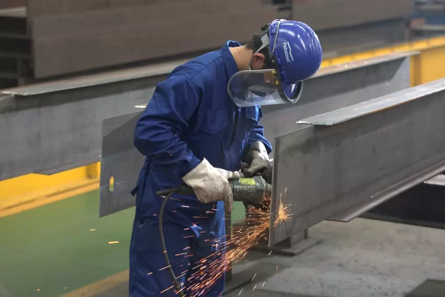 Steel fabrication work in progress — an essential step in building industrial warehouses, workshops, and logistics hubs