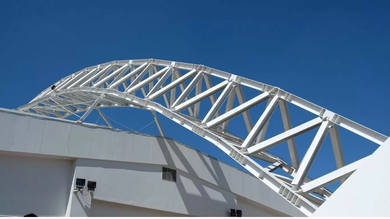 modern metal trusses of stadium roof construction
